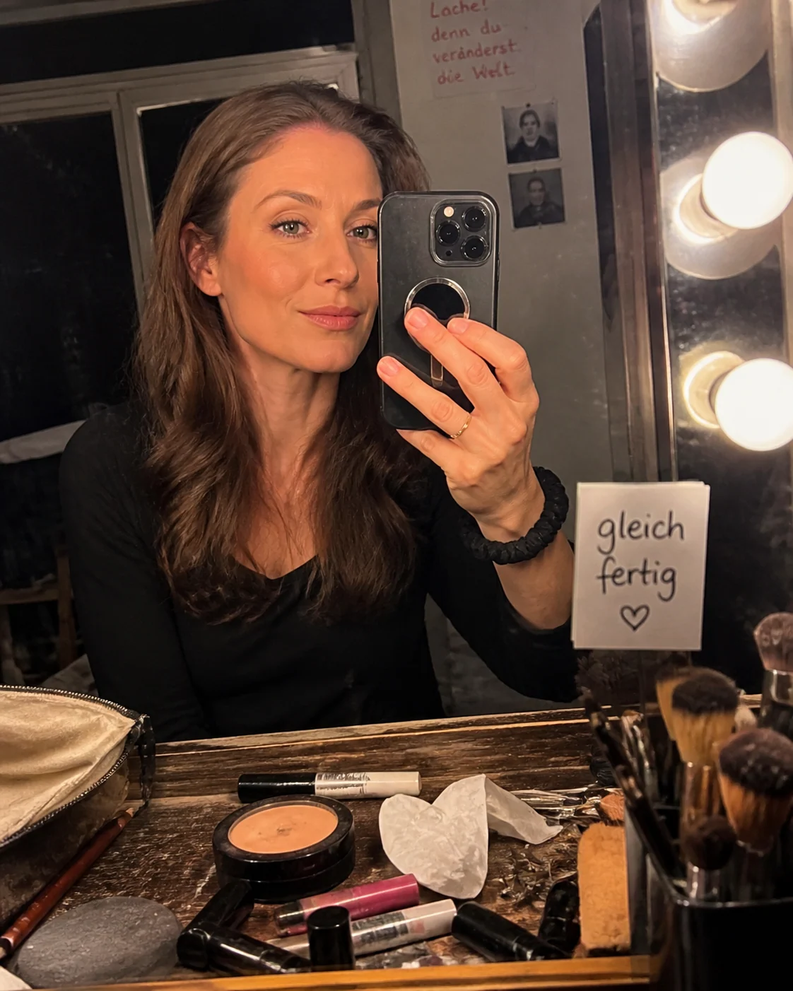 Adult backstage makeup phone flash selfie