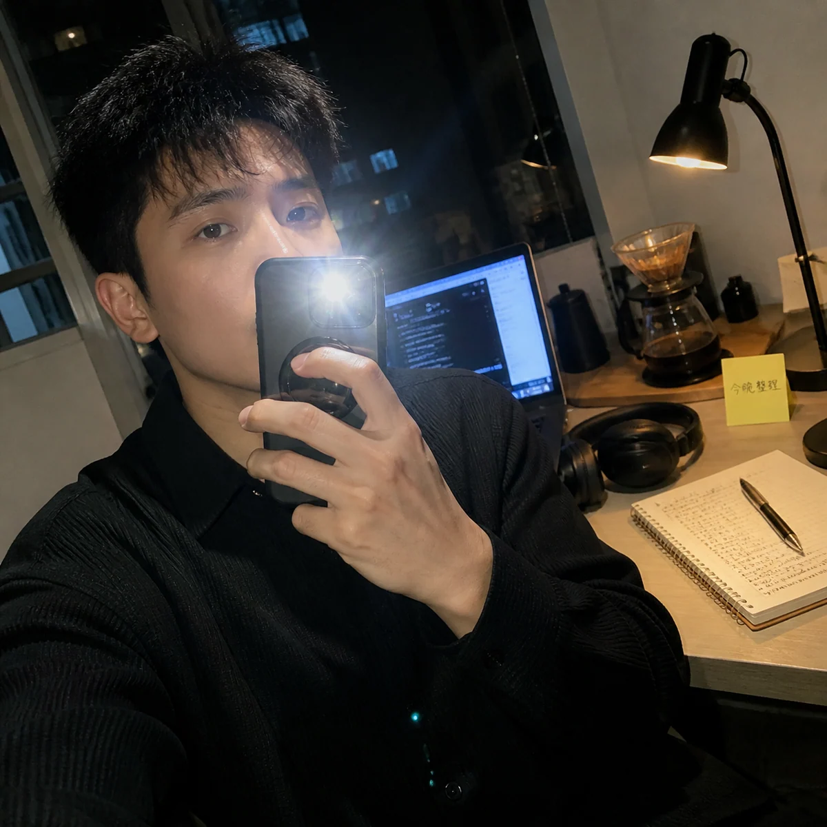 Adult desk selfie with direct phone flash