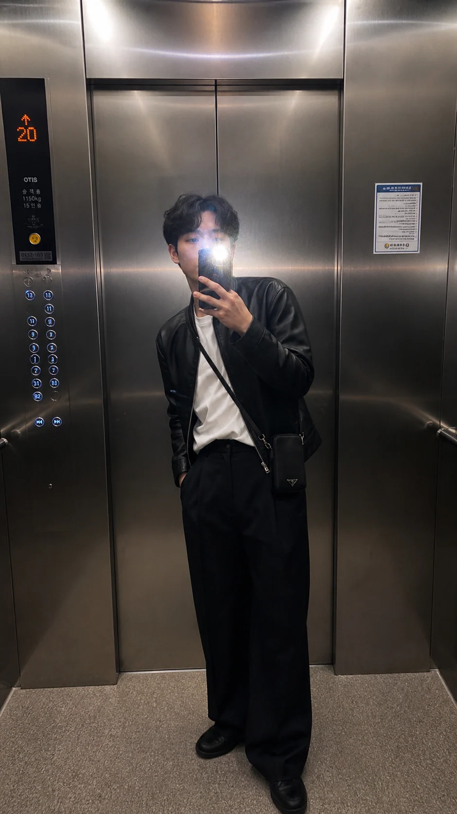 Adult elevator fashion selfie with flash reflection